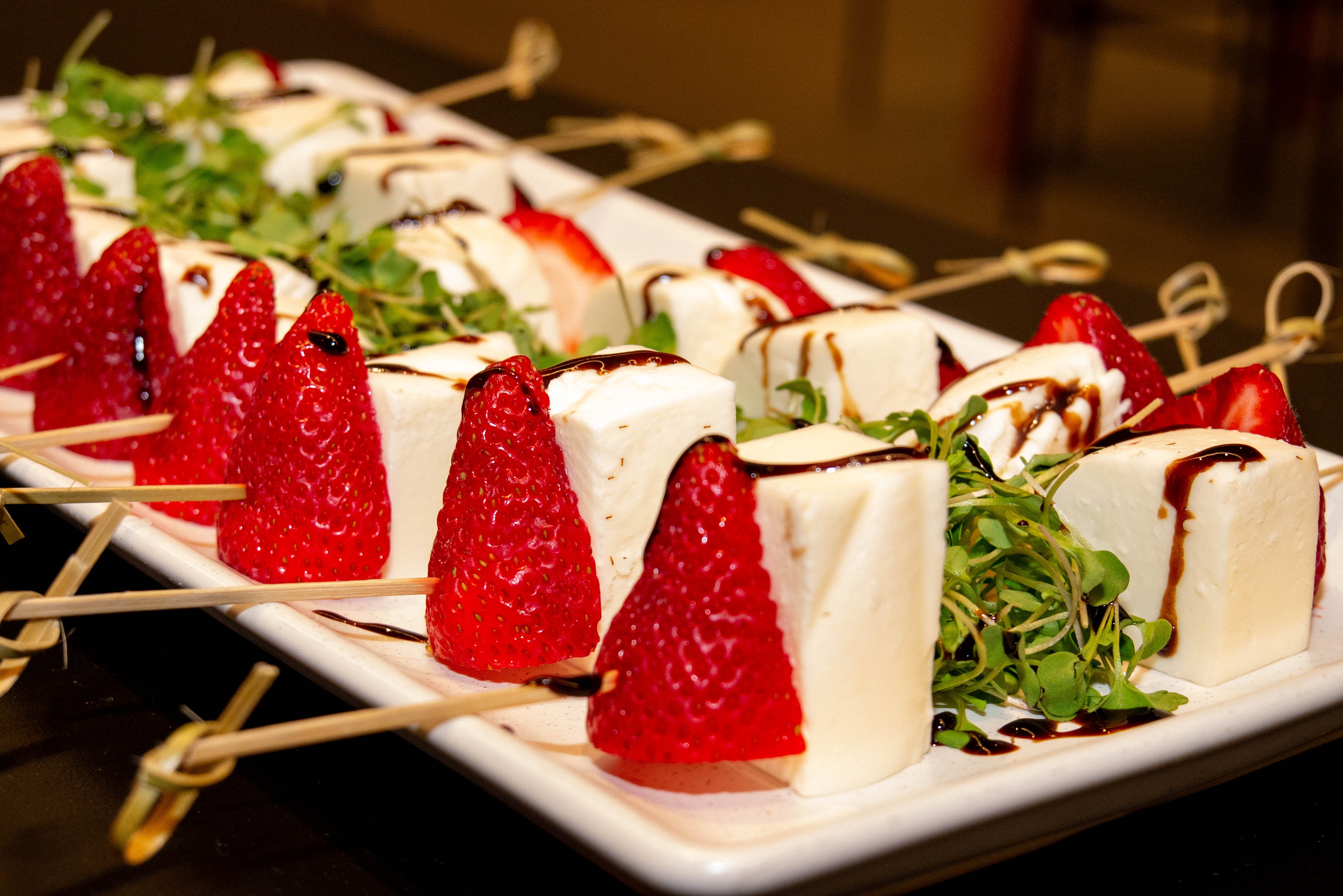 Delicious vinaigrette glazed, strawberry, basil, mozzarella skewers served at EBI SF.